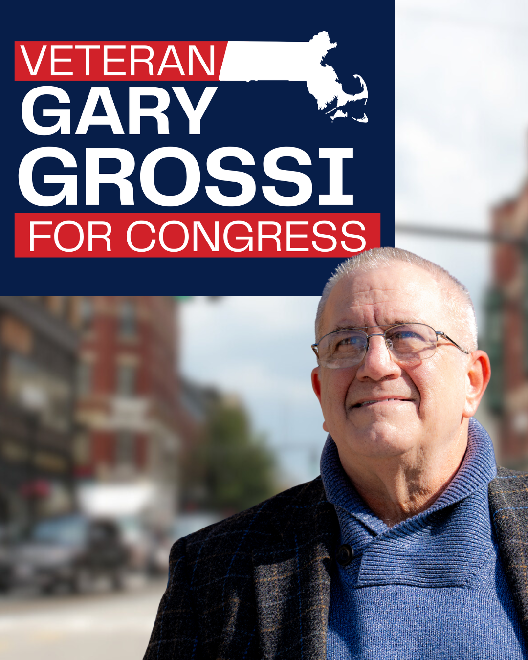 Gary Grossi in a navy blazer on a New England main street